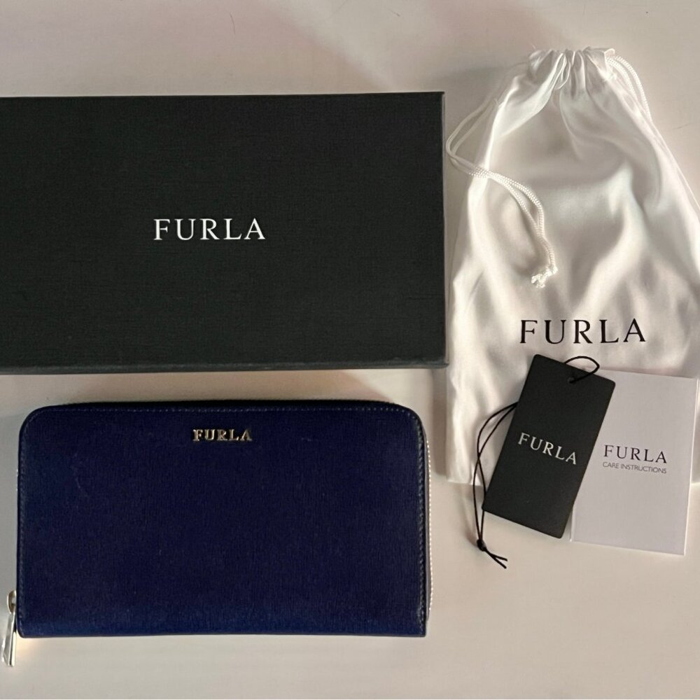 Furla extra large zip around leather wallet. Brand new with tags in box